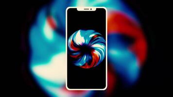 Abstract silhouette of a new new smartphone with blurred animation behind it on black background. Motion. Rotating colorful spiral on a phone screen. video