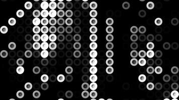 Huge amount of randomly moving rings or circles, seamless loop, black and white. Motion. Monochrome blinking running circles wall. video