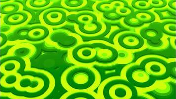 Glowing colorful green intersected circles creating a transforming a transforming and changing field. Design. Stains resembling falling rains drops. video