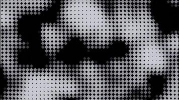Seamless looped background of black and white illuminated pixel waves. Design. Black stains resembling a cow print, monochrome. video