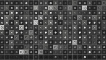 Digital animation of mosaic pattern wall, seamless loop. Motion. Monochrome blinking squares with small dots in the middle. video