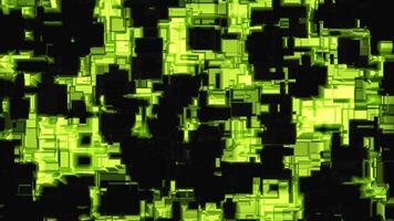 Black background. Design. A bright background with green and orange illuminated particles that flash like puzzles in turn in abstraction. video