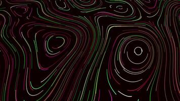 Abstract creative neon lines making colorful trails on black surface. Motion. Curved and bended stripes moving slowly on a black background. video