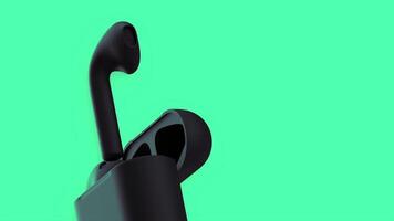 Green background with black airdrops. Motion. Black wireless headphones in a case move in abstraction in a green background. video