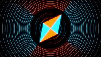 A bright abstraction from the circle .Design. In the center of the circle is a rhombus that rotates clockwise and around it is an outline of blue and orange circles with light . video