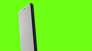 Close up of an abstract smartphone with black screen isolated on a bright green background. Motion. New phone presentation, chroma key. video