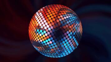 Disco ball in abstraction. Motion. A disco ball that shimmers with different colors and spins on a simple black background. video