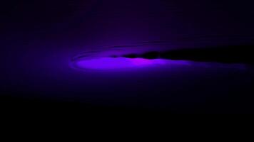 Background.Design. A black background and a comet in purple that falls on the background. video