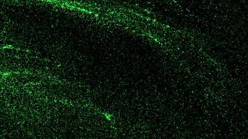Black background with green glitter . Motion. The background on which bright green particles move in abstraction. video