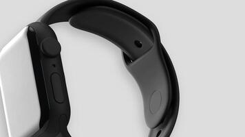 Black smart watch moving on a light background in abstraction. video