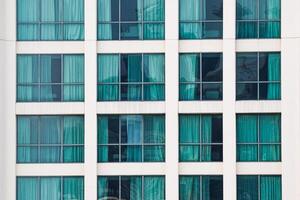 Facade of modern building in Singapore photo