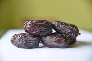 Close-up of organic gourmet Medjool date fruit at the market. View from above. photo