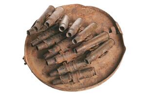 Antique machine gun rusty cartridges photo