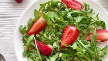 Vitamin salad of strawberry with arugula video