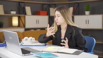 Stressed businesswoman working. video