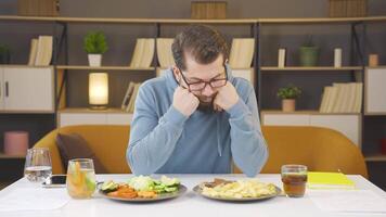 Man who is bored of dieting, forced diet video