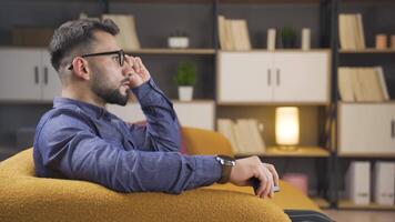 Angry and unhappy man watching TV. video