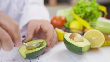 Dietitian showing avocado. video