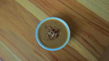 bowl of peanut sauce, suitable for seasoning satay, gado-gado, ketoprak, and others photo