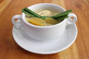 A bowl of banana compote seen above, is suitable for breaking the fast or advertising product photos during the month of Ramadan