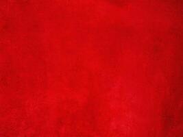 Bright red suede texture background. Red suede leather. photo