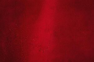 Red suede as a background. Suede macro texture studio photo. photo