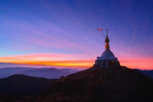 The pagoda on the top of the hill in the morning photo