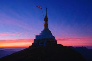 The pagoda on the top of the hill in the morning photo