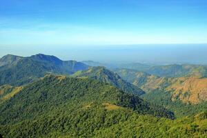 The green mountains in the morning are sunny. photo