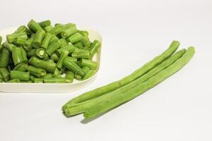 Fresh raw chickpeas or chickpeas, nuts contain protein. Freshly cut regular beans or chickpeas on a rustic white background photo