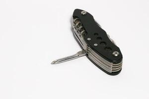 Pocket knife. Steel arm. Multi tool kit. A small folding knife was tied. Multi tool for climbing. White background pocket folding knife photo