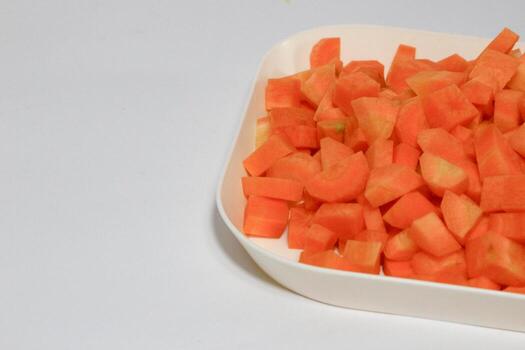 Chopped Carrot Cubes, Vegetable Pattern Background photo