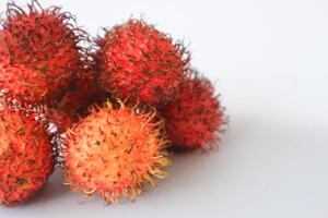 Rambutan taxonomic name, Nephelium lappaceum is a medium sized tropical tree in the Sapindaceae family photo