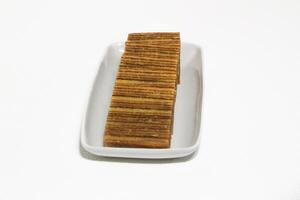 Lapis legit or traditional Indonesian sweet lapis cake on a white background photo