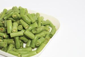Fresh raw chickpeas or chickpeas, nuts contain protein. Freshly cut regular beans or chickpeas on a rustic white background photo