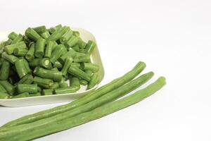 Fresh raw chickpeas or chickpeas, nuts contain protein. Freshly cut regular beans or chickpeas on a rustic white background photo