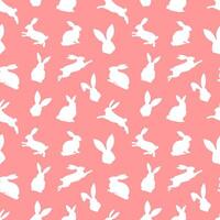 Easter seamless pattern of white rabbit silhouettes in different actions. Festive Easter bunnies design. Isolated on red background. For Easter decoration, wrapping paper, greeting, textile, print vector