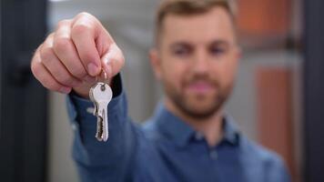 Close up of friendly manager in window shop with keys. A large selection of windows and doors for the house video