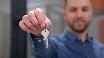 Close up of friendly manager in window shop with keys. A large selection of windows and doors for the house video