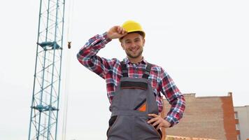 View of an attractive worker on a construction site video