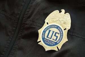 KYIV, UKRAINE - MARCH 9, 2024 US DEA Special Agent badge on black jacket uniform photo