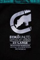 KYIV, UKRAINE - 4 MAY, 2023 Ecko Unltd company logo on new brand clothes photo