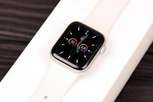 KYIV, UKRAINE - 4 MAY, 2023 Apple Watch series five 5 on black background photo