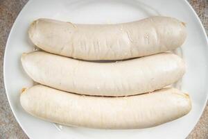 White sausage meat weisswurst bavarian sausages second course fresh Cooking appetizer meal food snack on the table copy space food background photo