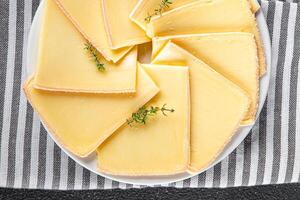 raclette cheese tasty eating cooking appetizer meal food snack on the table copy space food background photo