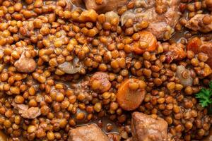 lentils with meat beef or pork fresh cooking appetizer meal food snack on the table copy space food background rustic photo