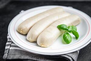 sausage meat weisswurst bavarian sausages second course fresh Cooking appetizer meal food snack photo