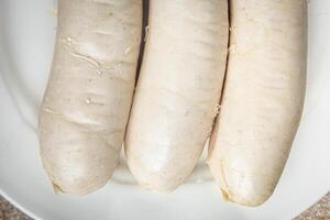 meat white sausage weisswurst bavarian sausages cooking appetizer meal food snack on the table photo