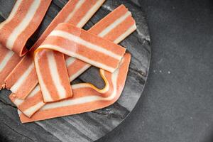 vegetariano tocino Fresco Cocinando aperitivo comida comida bocadillo en el mesa Copiar espacio comida antecedentes vegetariano vegano foto