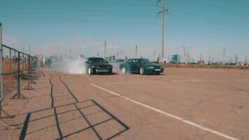 Drifting car, professional driver drifting car on asphalt race track. smoke and dust video